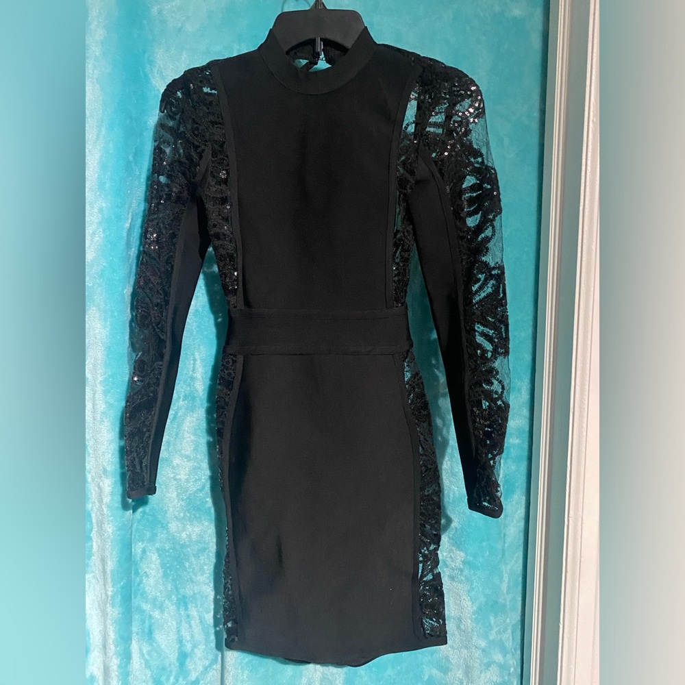 Alyce Paris x-small elegant black party dress. Long sleeves with open back.